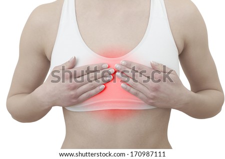 Acute pain in a woman chest. Female holding hand to spot of chest-ache. Concept photo with Color Enhanced blue skin with read spot indicating location of the pain. Isolation on a white background. 