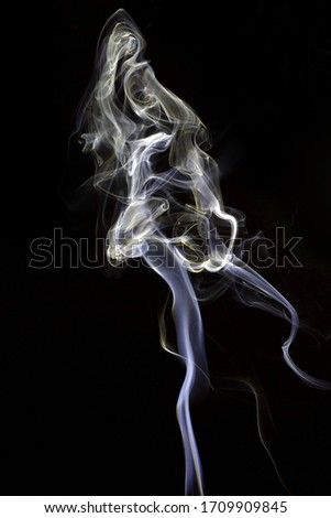 Black background with grey smoky curves