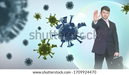 Young businessman shows stop sign among coronavirus cells. Danger everywhere concept.
