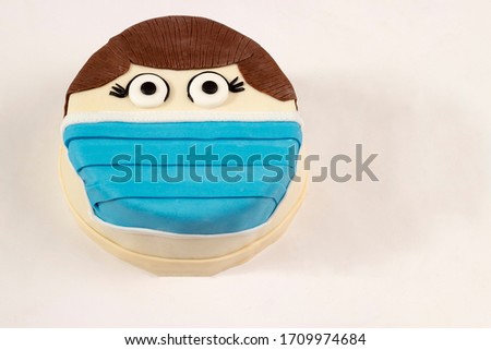 Medical mask cake, Birthday cake 2020 during corona virus pandemic, top view