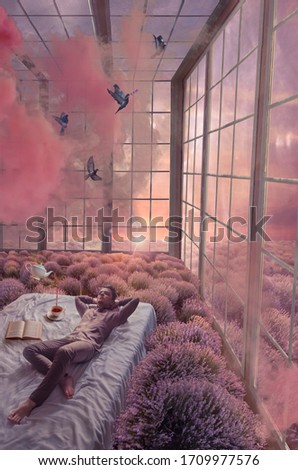 Man lies on a bed in lavender