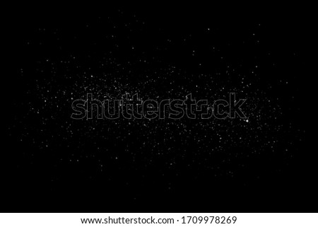 Isolated Dust Dirt Particles Salt Snow Powder Spray. Authentic Black Rough Grunge Distressed Overlay Texture Surface.  Royalty-Free Stock Photo #1709978269