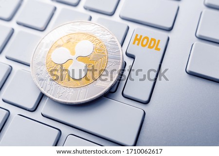 ripple hodl concept. Toned soft focus picture. Conceptual image for worldwide cryptocurrency and digital payment system.