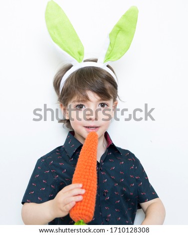 cute Easter bunny boy in studio