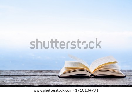 The Bible placed on the table was opened for learning to understand the Bible in order to pray to God and to ask God to protect himself and his family. The concept of Bible learning and faith in God
 Royalty-Free Stock Photo #1710134791