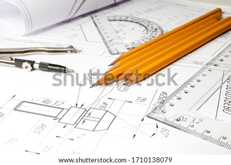 drawing details on the table, compasses, protractor, ruler pencil