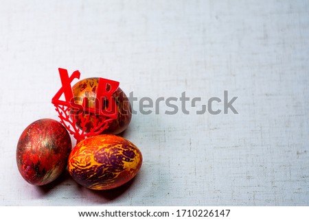 Painted in different colors Easter eggs on a white background