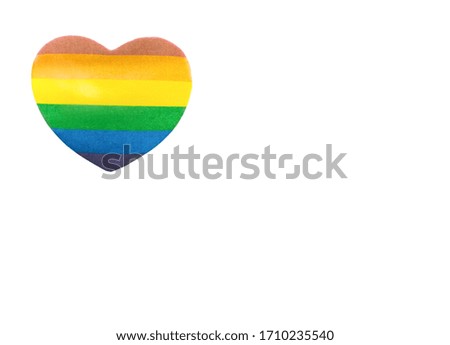 Paper heart painted in the color of the LGBT flag isolated on a white background