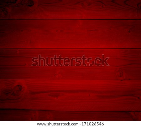 Concept or conceptual red old vintage wooden Christmas or Valentine`s Day plank wood wall background, metaphor to holiday decorative celebration dirty weathered grungy aged xmas happy romantic winter