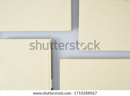 Top view of a formation of books forming a cross, concept photo