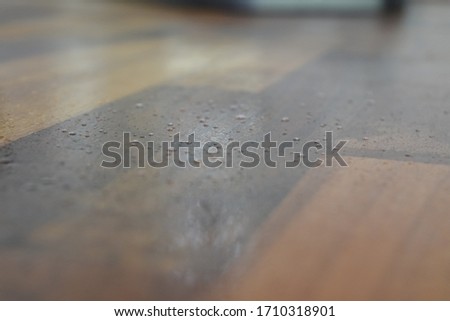 Virus sneeze cough on wood surface 