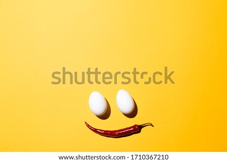 smile in the form of a face with pepper and eggs
