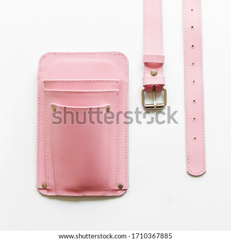 Pink leather floristic holster on a white background