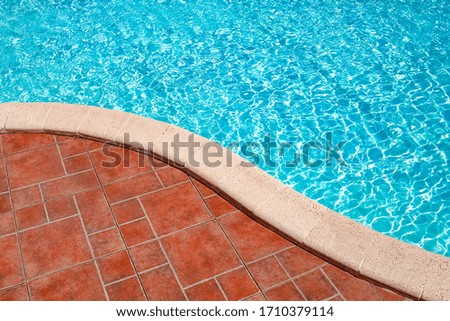 Step in the pool by the sea nature background. For bathing turquoise water.
