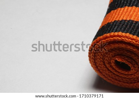 9 may - St. George Ribbon. Isolated on white. The symbol of the Second World war. 9 May Victory Day background. The symbol of the great victory of May 9