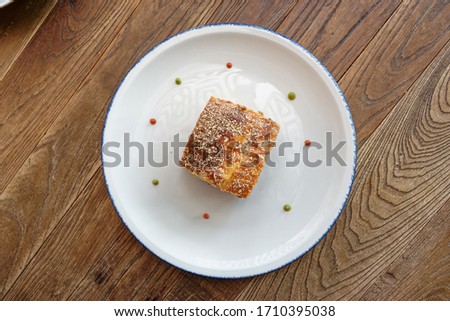 Slice of moussaka, traditional Greek and Balkan dish, shot from above