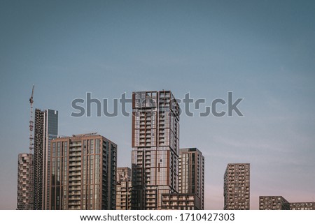 
Modern city skyscrapers on blue sky