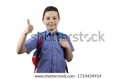 Back to school. Back to school concept. Boy with a backpack on a white isolated background. All OK. Banner. copyspace
