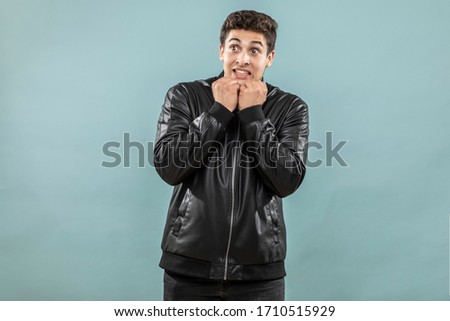 expression and people concept - young man with funny face. Adult over 20 years of age.