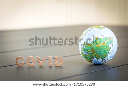 covid word and globe ball, coronavirus concept background