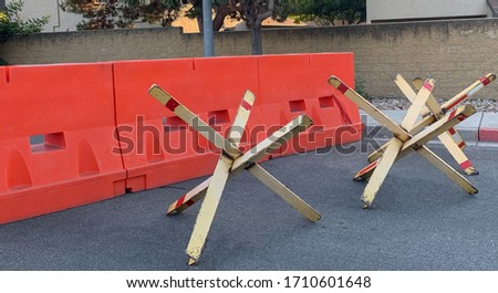 Picture of barricades to prevent automobiles from entering. Double barricades for extra protection.