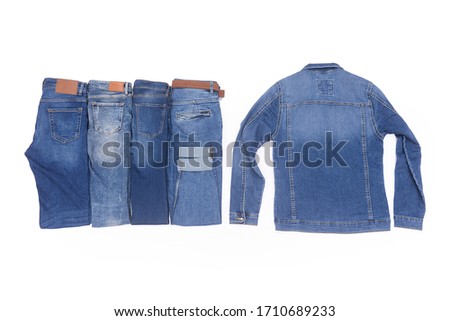 three Blue Denim jeans trouser and jeans jacket isolated over white background. Back view Jeans
