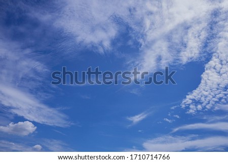 Blue sky and white clouds background in summer