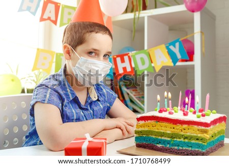 Child sits alone on her birthday. Depression from lack of friends