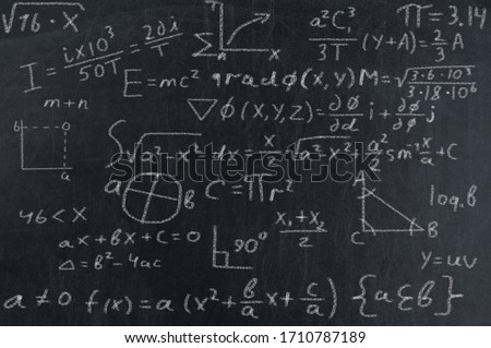 Close up of math formulas on a blackboard Royalty-Free Stock Photo #1710787189