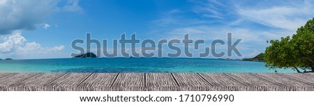  texture of wooden floor with the beautiful sea  view backdrop for display product,background.