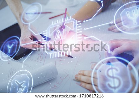 Double exposure of data theme hologram drawing and man and woman working together holding and using a mobile device.