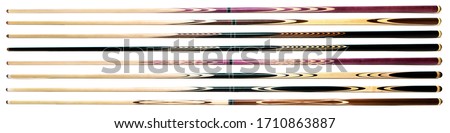 billiard cue sticks isolated on white background