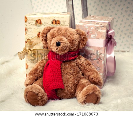 Cute toy bear with christmas gift