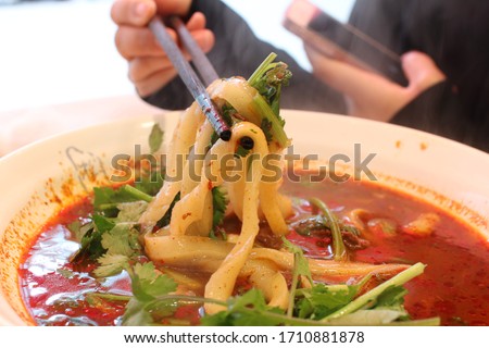knife-shaved noodles (pared or shaved into strips), a Shanxi specialty
