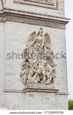 Arc de Triomp with elements of sculptures designed by Jean Chalgrin in 1806 on Place de Gaulle in Paris, France