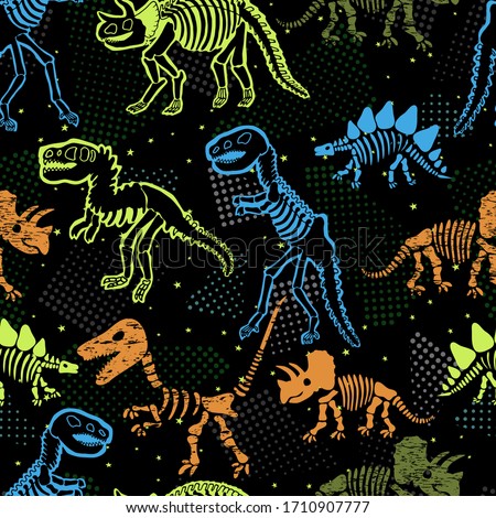 Dinosaur skeleton. Vector seamless pattern. Original design with dinosaur bones. Black background with dots. Desing for textile, clothes. Royalty-Free Stock Photo #1710907777