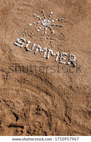 Summer picture from pebble and sand on a beach. Summer background