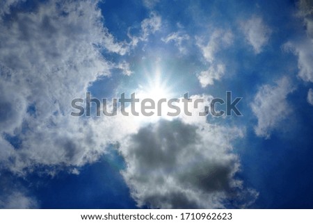 lovely white clouds on blue sky in summertime background