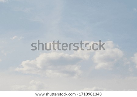 Blue sky with white clouds, spring clouds against the sky.