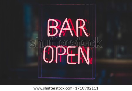 Neon sign saying Bar Open