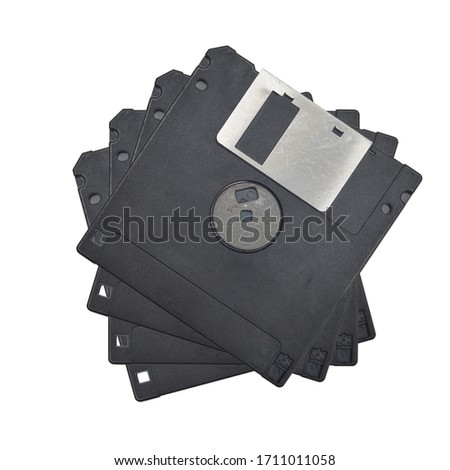 Magnetic floppy disc on a white background.
