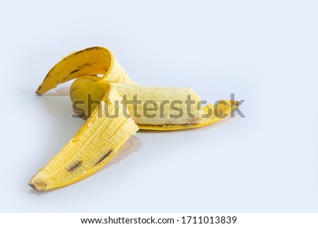 Separate banana fruits that are yellow on a white background