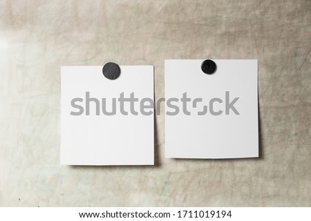 Blank polaroid photo frame with soft shadows and magnet tape isolated on grey paper background as template for graphic designers presentations, portfolios etc.  magnetic board