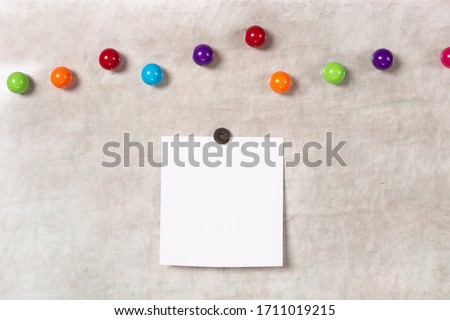 Blank polaroid photo frame with soft shadows and scotch tape isolated on grey paper background as template for graphic designers presentations, portfolios etc. kids. magnetic board