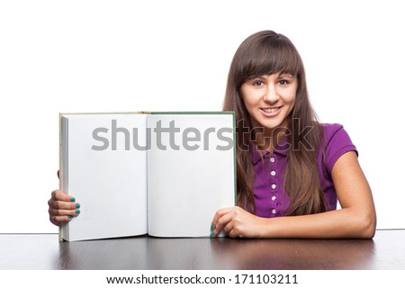 caucasian smiling girl holding open book isolated on white
