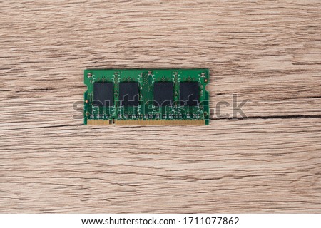 Memory computer placed on a wooden table