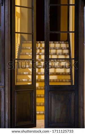 Wooden door with windows of colonial construction