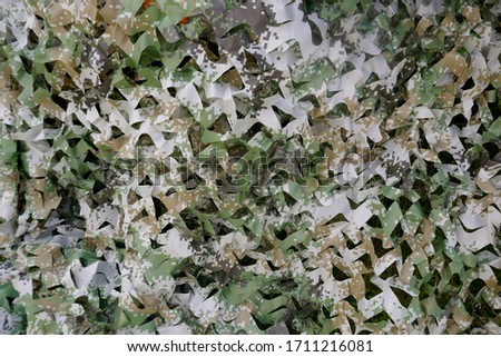 Camouflage net. 
Close up, texture, background
