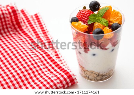Yogurt Oatmeal Breakfast and fruits on the black background