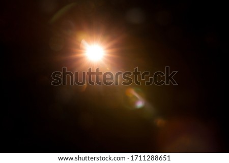 Abstract Natural Sun flare on the black Royalty-Free Stock Photo #1711288651